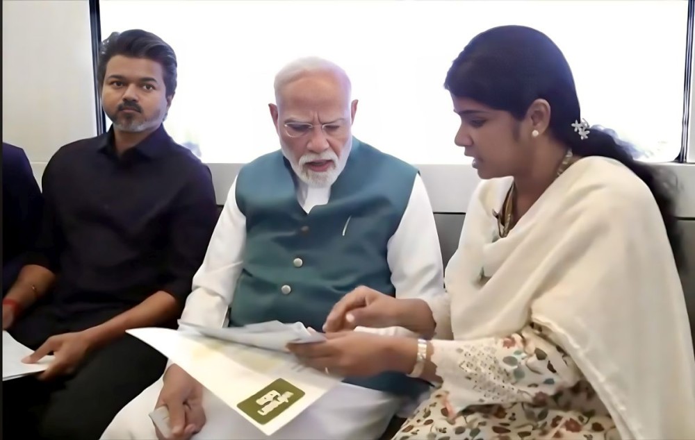 Prime Minister Narendra Modi interacting with Dr Sheena C Pravin, CEO of MEDxAI Innovations and faculty at VIT Chennai.